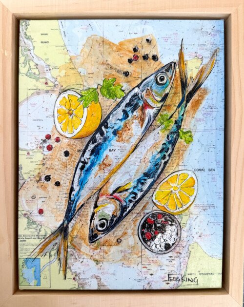 "Local Catch" is a mixed media artwork by Australian artist Jess King, featuring two sardines with lemon, parsley and peppercorns painted in acrylic and pen over a vintage nautical chart of Moreton Bay and the Coral Sea. It is part of Jess King's map-based still-life body of work.