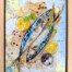 "Local Catch" is a mixed media artwork by Australian artist Jess King, featuring two sardines with lemon, parsley and peppercorns painted in acrylic and pen over a vintage nautical chart of Moreton Bay and the Coral Sea. It is part of Jess King's map-based still-life body of work.